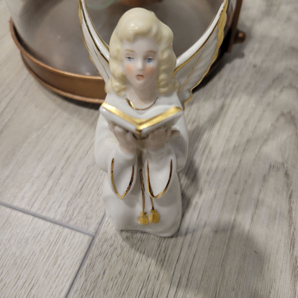 Angel with a book